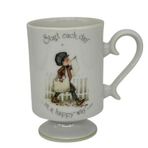 Vintage Holly Hobbie 1974 Porcelain Footed Mug "Start Each Day..." Newspaper Boy